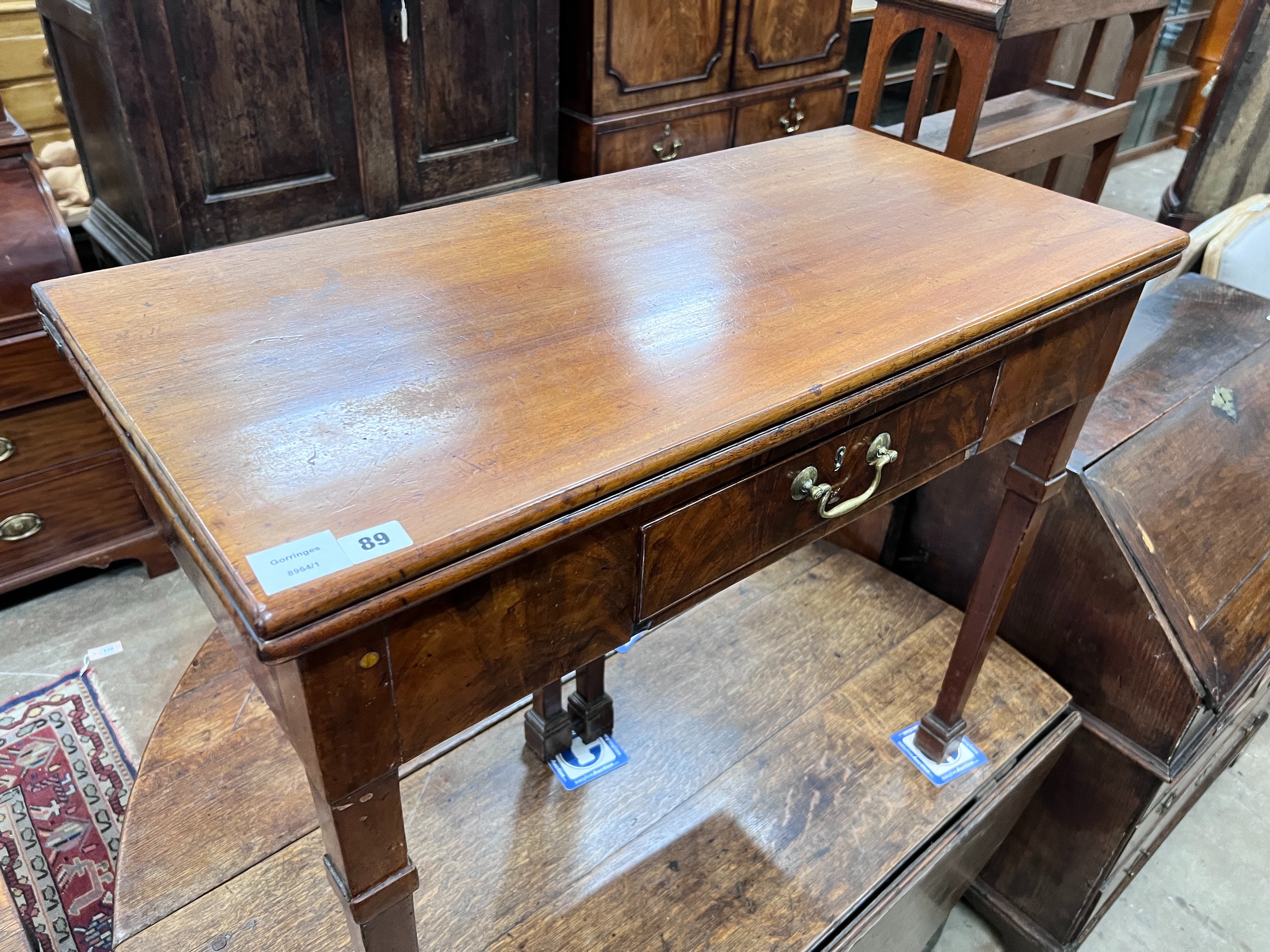 A George III mahogany rectangular folding tea table, width 86cm, depth 42cm, height 73cm *Please note the sale commences at 9am.